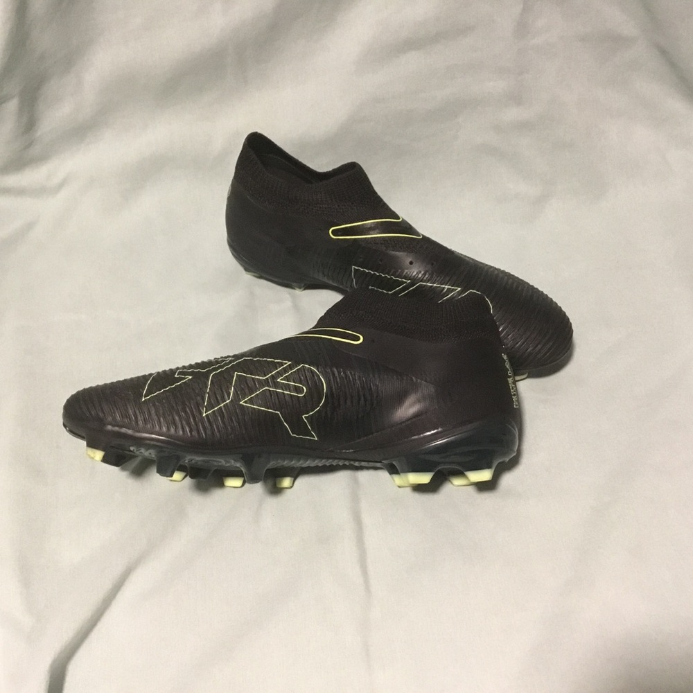 Puma Black Soccer Cleats with Neon Yellow Accents